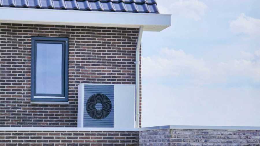 air-source-heat-pump-unit-installed-outdoors-at-a-2024-04-16-18-06-35-utc-min